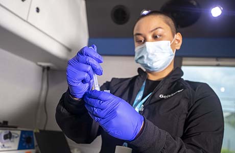 an image of a lab worker