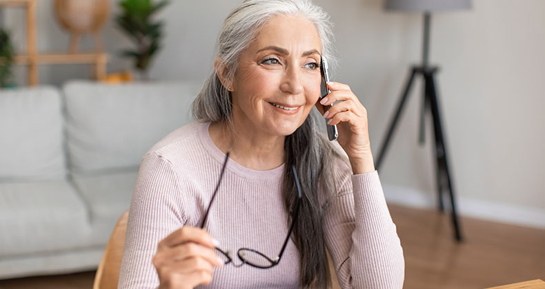 Woman talking on phone.