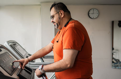 A man working out on a treadmill