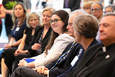 Olivia Zehel, a medical student at Geisinger Commonwealth School of Medicine, is featured in this meeting photograph.