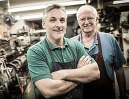 Two men working in a shop